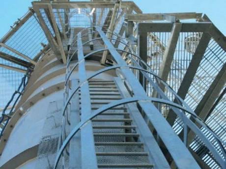 This is a communication tower with steel grating fence and floor.