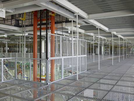 There is steel grating partition in the second floor of factory.