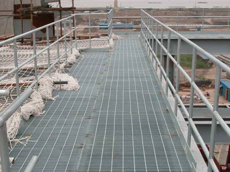 This is a two-story walkway made of steel grating in mining industry.