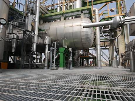 There are many power generation devices on the steel grating floor.