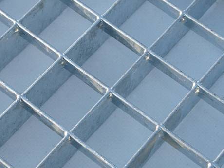 A press-locked steel grating with large mesh size.